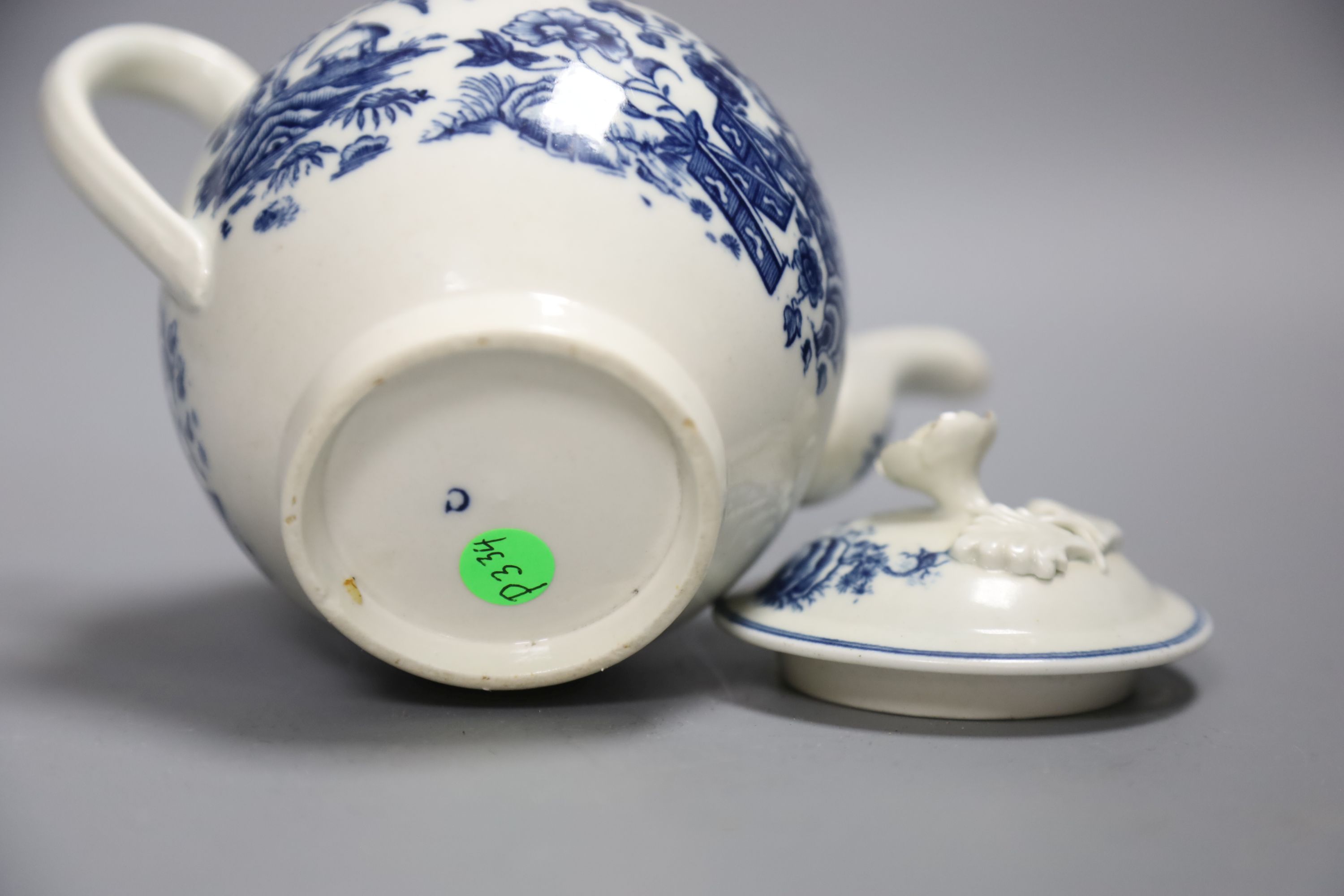 An 18th century Caughley tea pot and cover with the Fence in Blue pattern, C mark to base, height 13cm